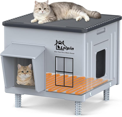 Plastic heated cat house with one cat on the roof and one inside