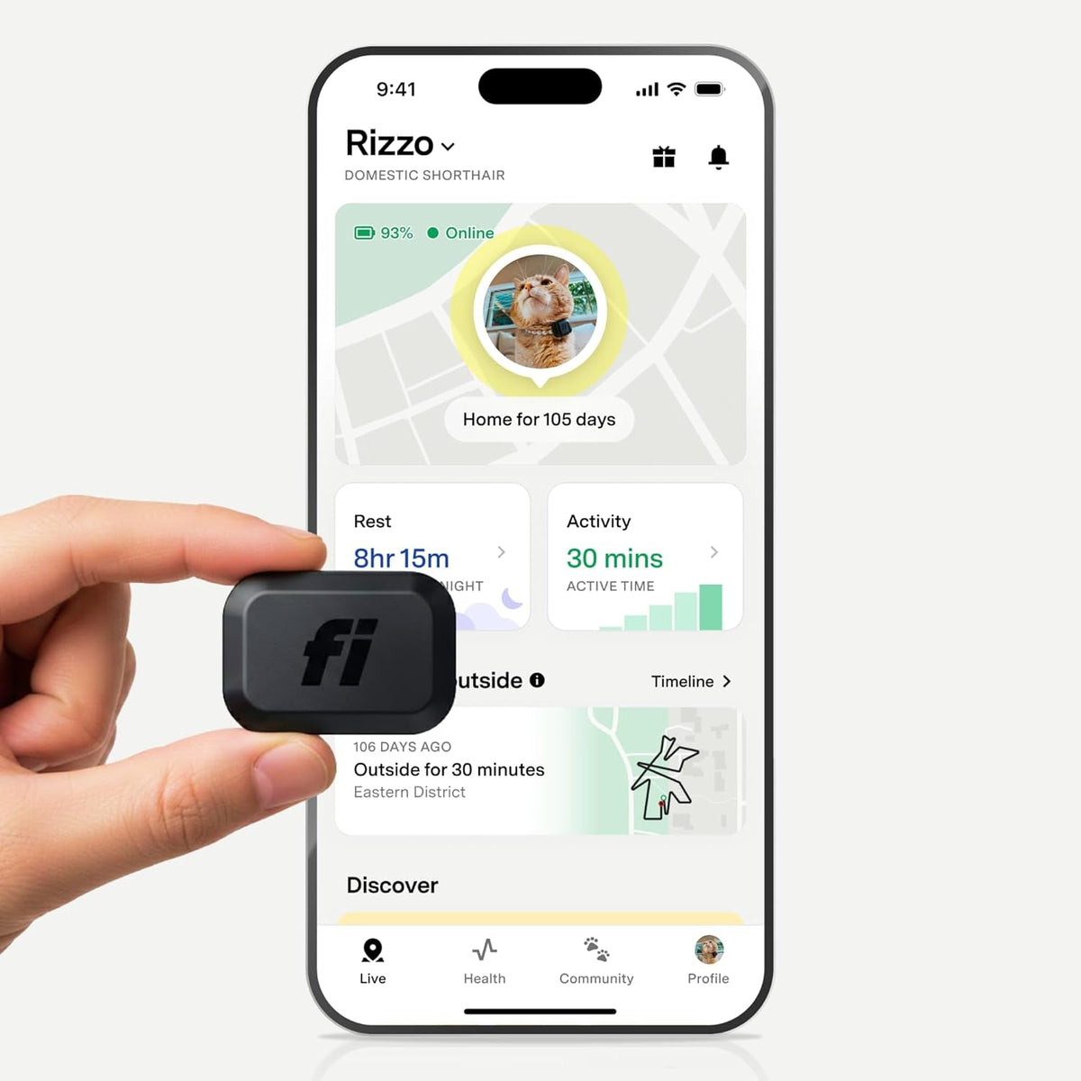 Fi Mini tracker held next to the Fi app location screen