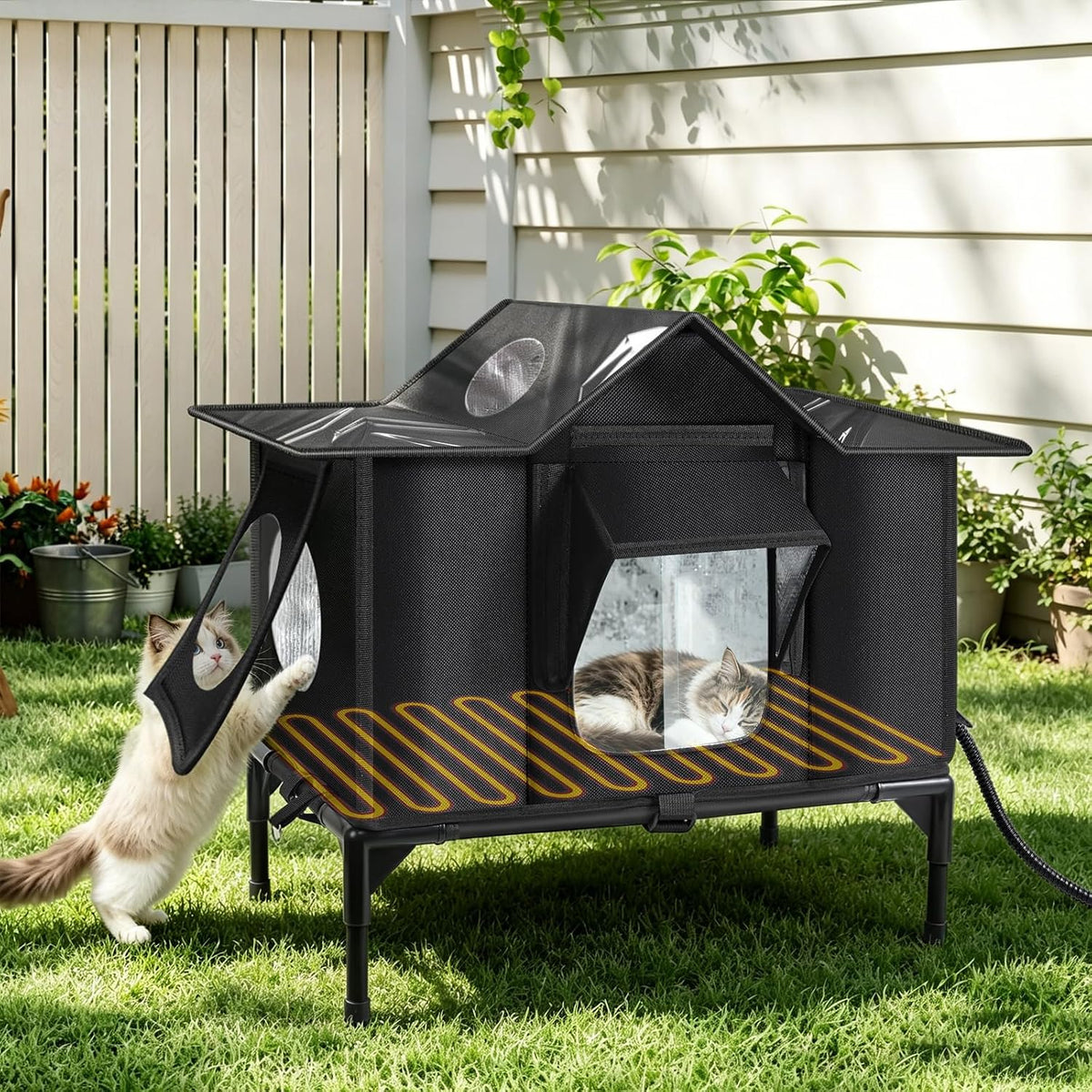 Heated outdoor cat house on grass with cat using side door