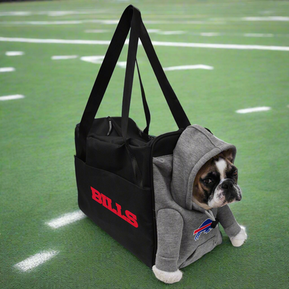 Dog peeking out of Buffalo Bills hoodie pet carrier