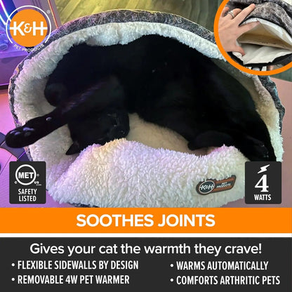 Black cat resting in a K&H Thermo-Snuggle Cup with removable 4-watt heater