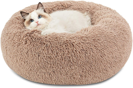 Bedsure Calming Donut Cat Bed 20-Inch Camel with a cat resting inside